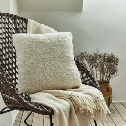 Coussin effet moutonné synthétique 45x45cm - blanc