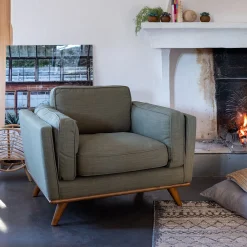 Fauteuil en tissu kaki cèdre