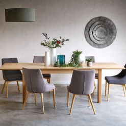 Table de repas extensible en bois - bois clair (8 à 12 places)