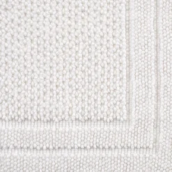 Tapis de bain en coton finition crochet et frangées 50x80cm - blanc